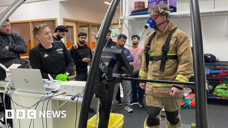 Lecturers help firefighter in charity fitness feats